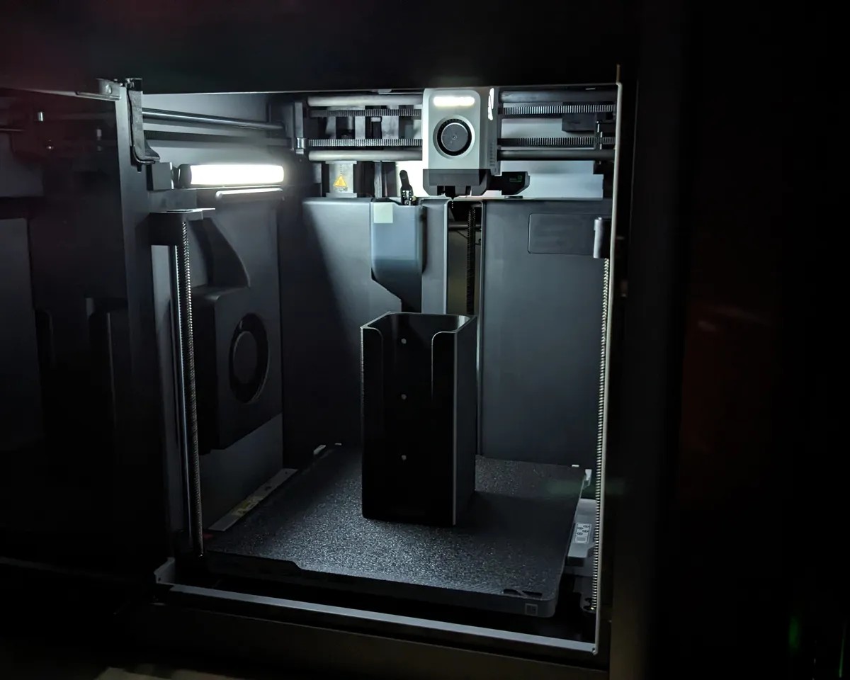 A part printing inside the enclosed P2S chamber